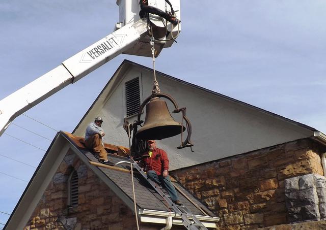 Removing the old chapel bell