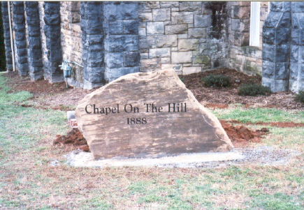 new stone sign placed and bedded in concrete